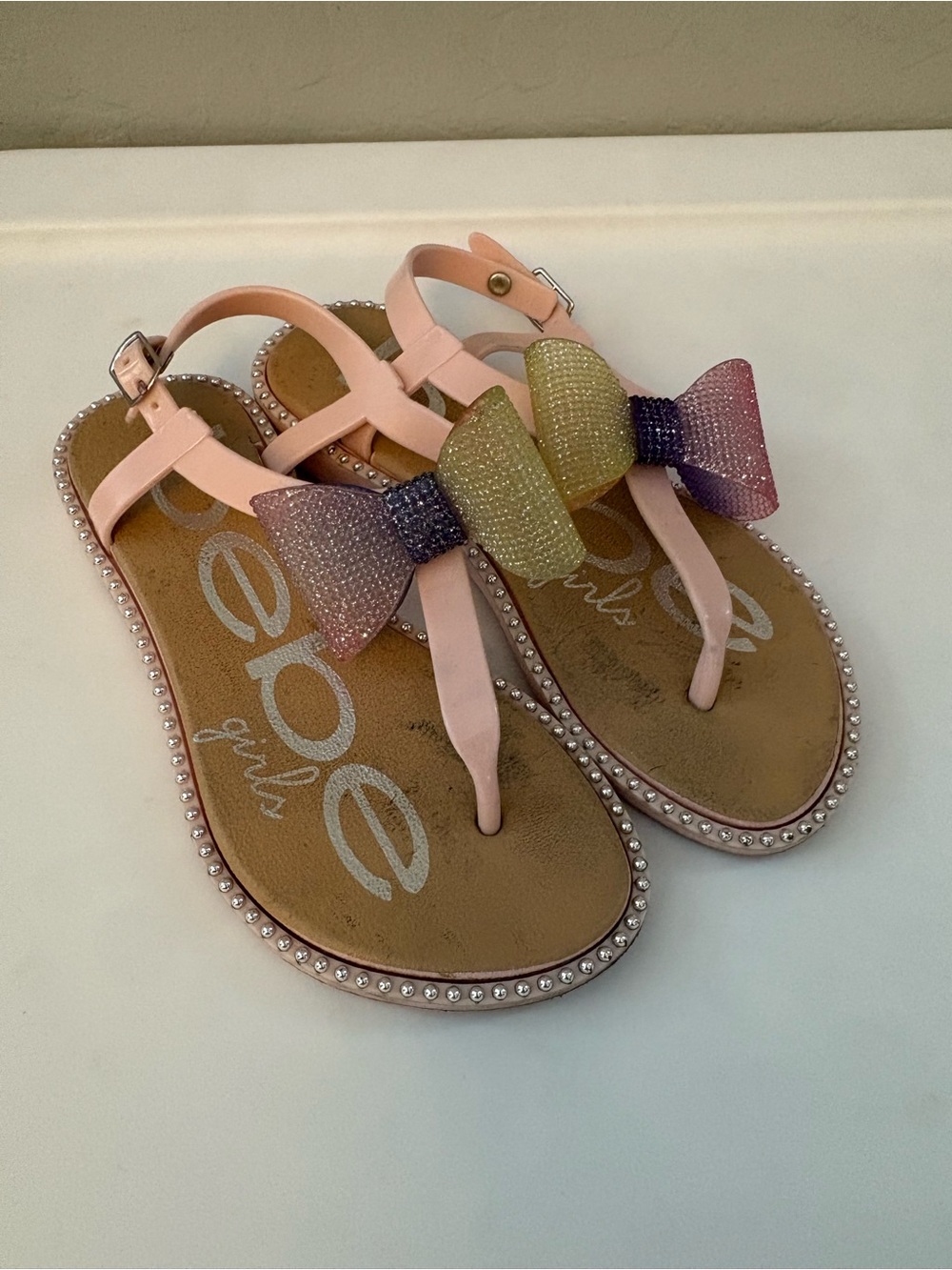 Bebe girls pink flip flop sandals with pink purple and yellow bow sz small 11/12